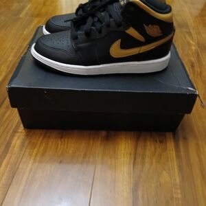 Air Jordan 1 Mid Black and Gold High-Top Sneakers. Size 4Y